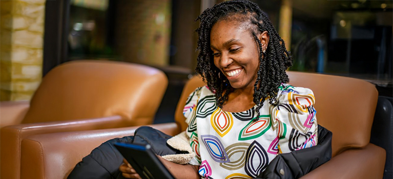 woman reading tablet